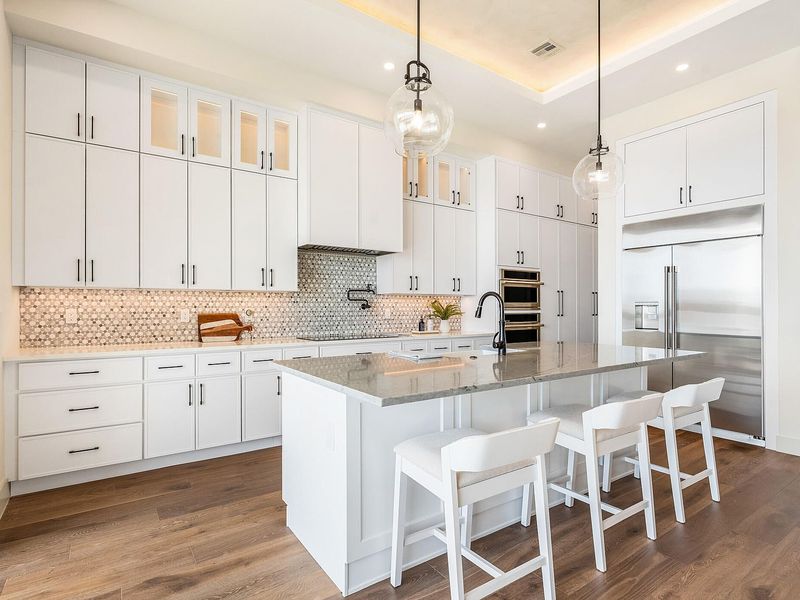 Refined kitchen with custom cabinetry