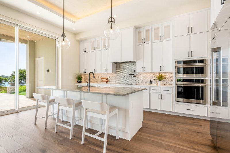 Refined kitchen with custom cabinetry